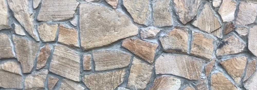 Отделка дома песчаником